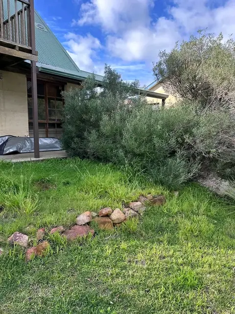 Back and side yard after a garden clean-up in Margaret River