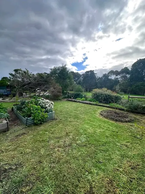 Mown lawns and tidy garden beds at a Margaret River town property
